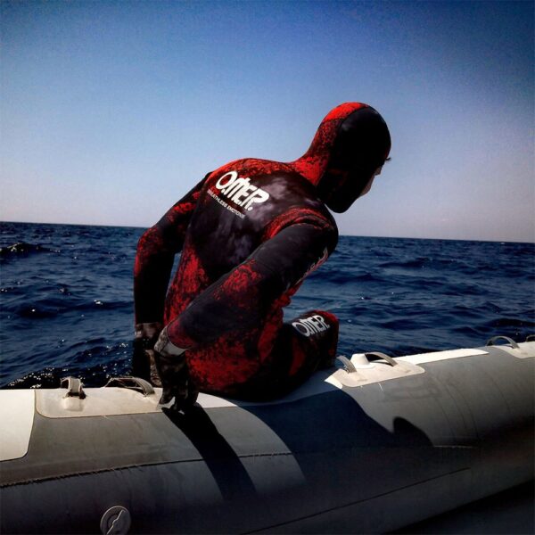 Omer Red Stone wetsuit on boat